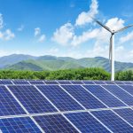 Solar,Panels,And,Wind,Turbines,With,Mountains,Landscape,Under,The